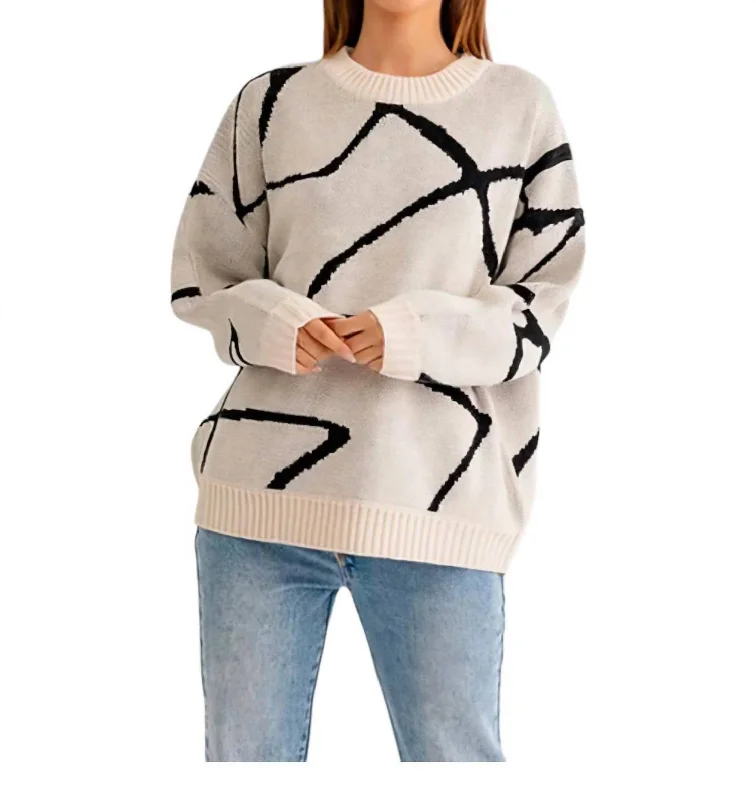 Women's V-Shaped Collar SweatersAbstract Pattern Oversized Sweater In Cream Black